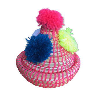 Wicker basket with lid and pom poms