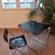 Vintage lot design – Platone table + black Plia chairs – Anonima Castelli