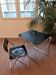 Vintage lot design – Platone table + black Plia chairs – Anonima Castelli