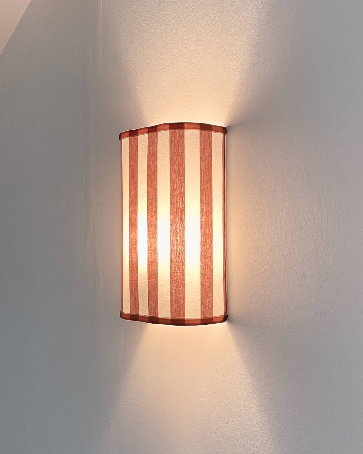 Pair of terracotta striped fabric wall sconces