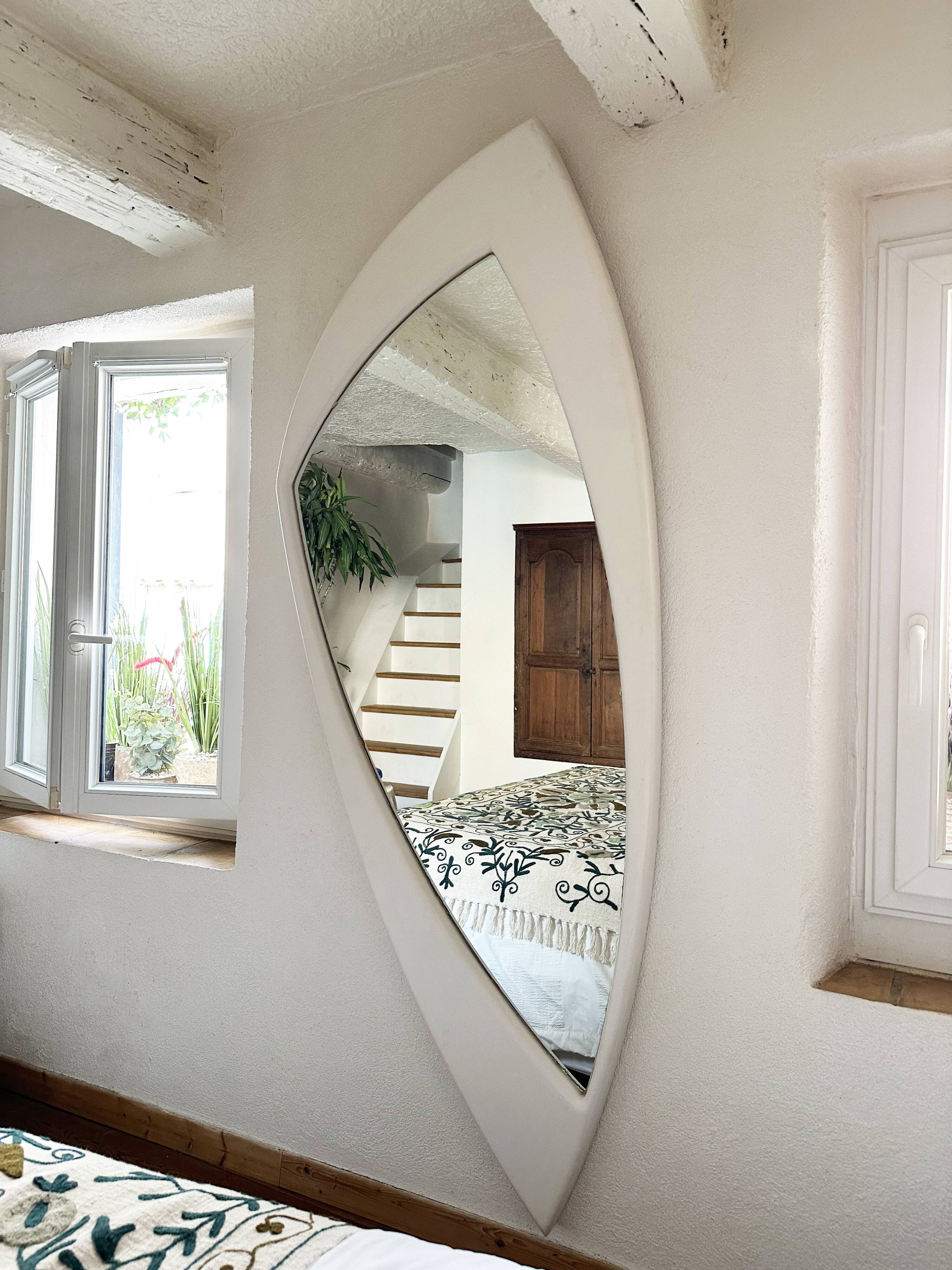 Dismantled Space Age XXL wall mirror in lacquered wood. France, 1970s.