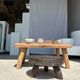 Coffee table in blond teak quadripod