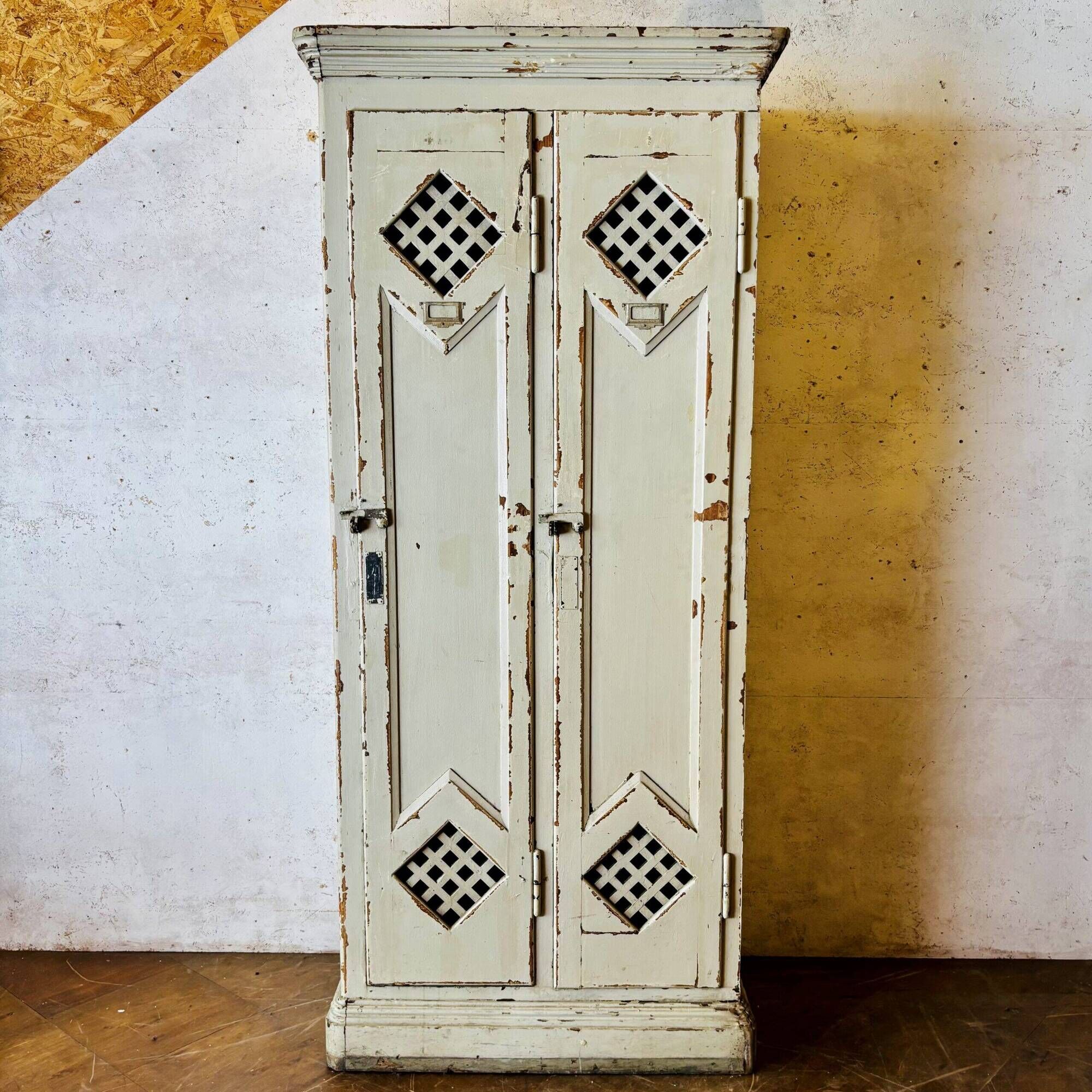 Old factory lacquered pine locker from early 20th century France.
