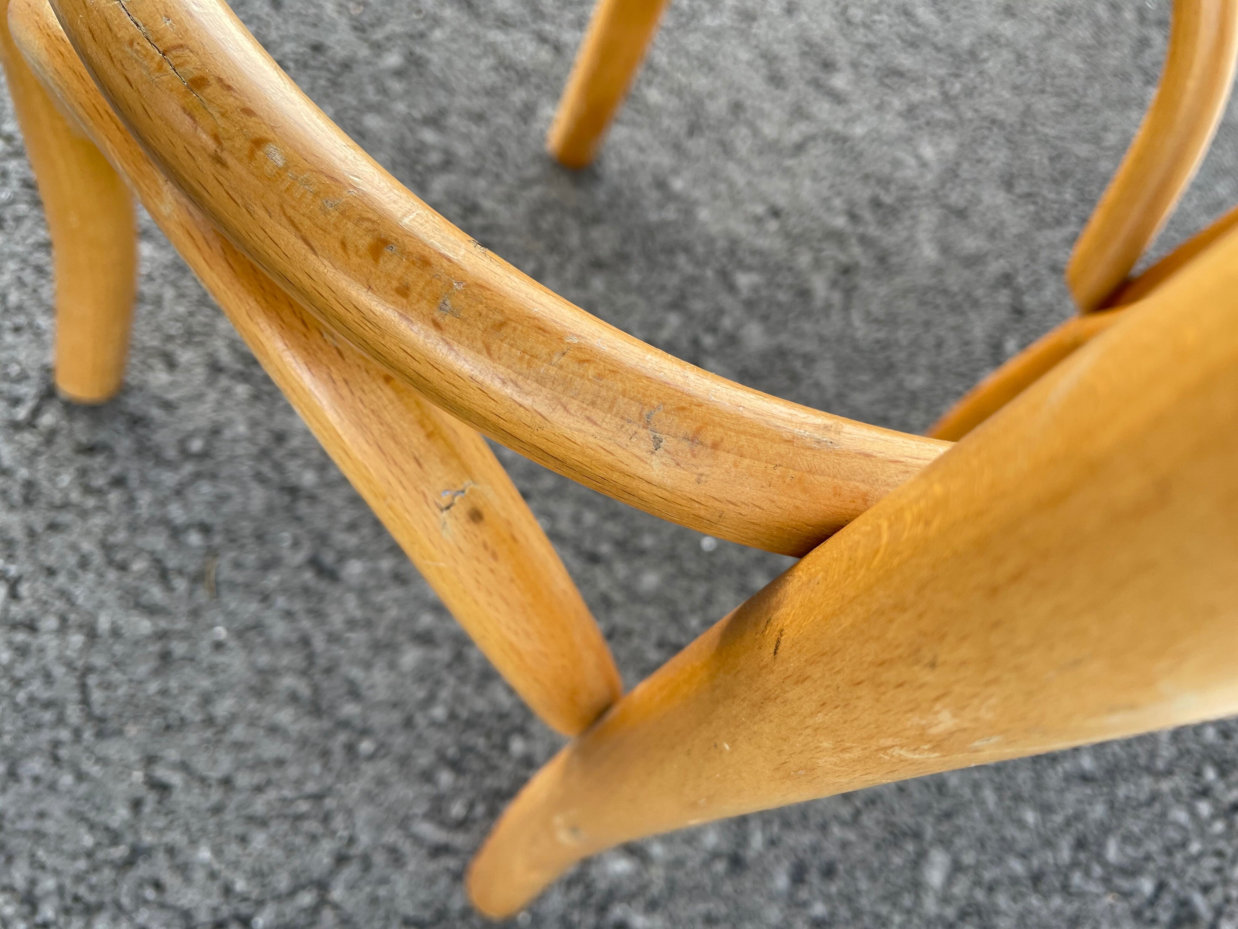 Curved wooden bar stool