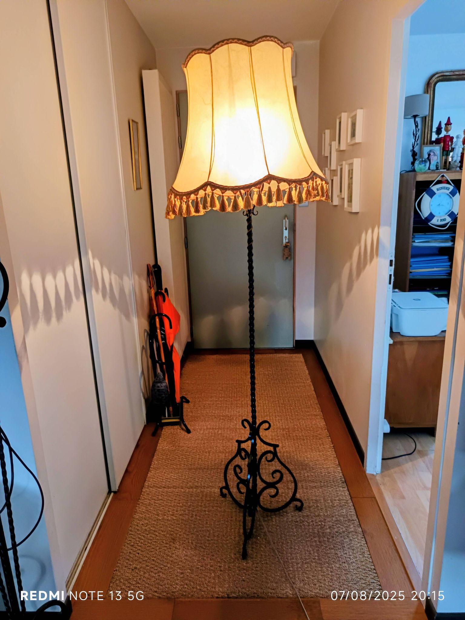 Black twisted iron lampstand with scrolled tripod base 1950/1960