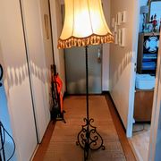 Black twisted iron lampstand with scrolled tripod base 1950/1960