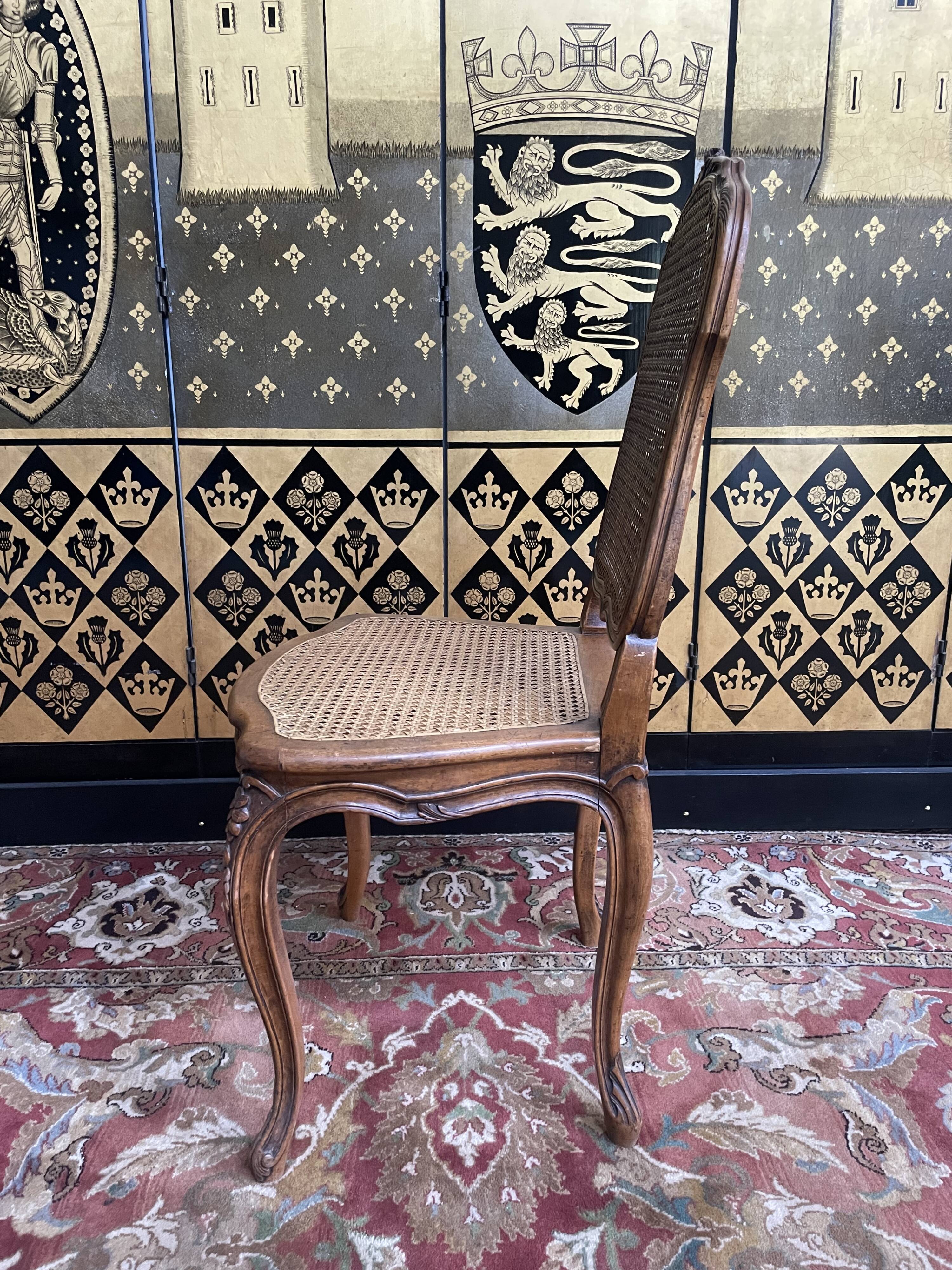 Suite of 8 Louis XV style chairs in canning
