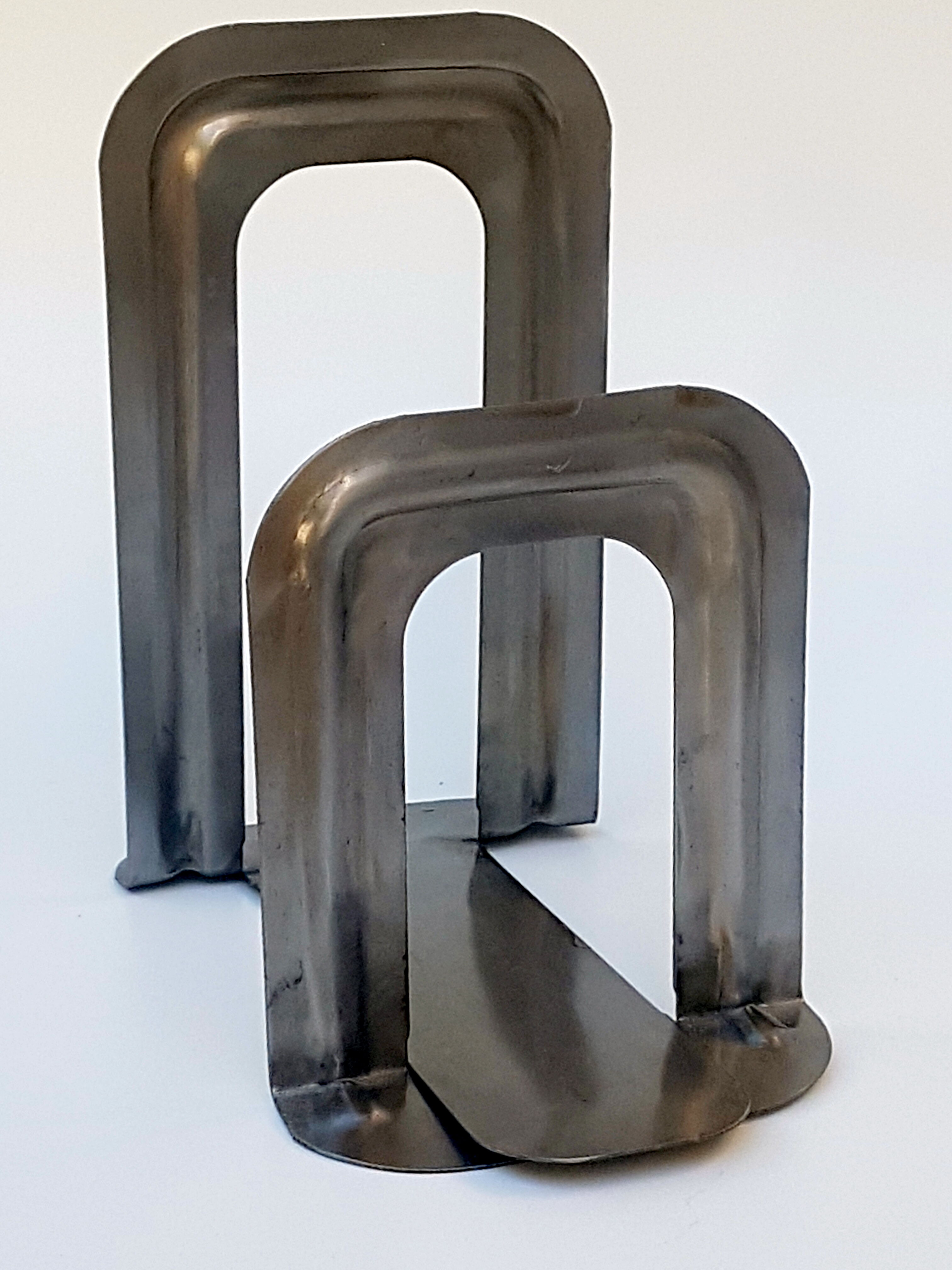 Metal book clamsended by Bernard-Albin Gras for Gras Ravel