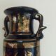Petit vase noir et or