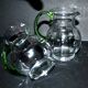 Set of 2 small blown glass wine pitchers - vintage green Alsatian balloon pitcher