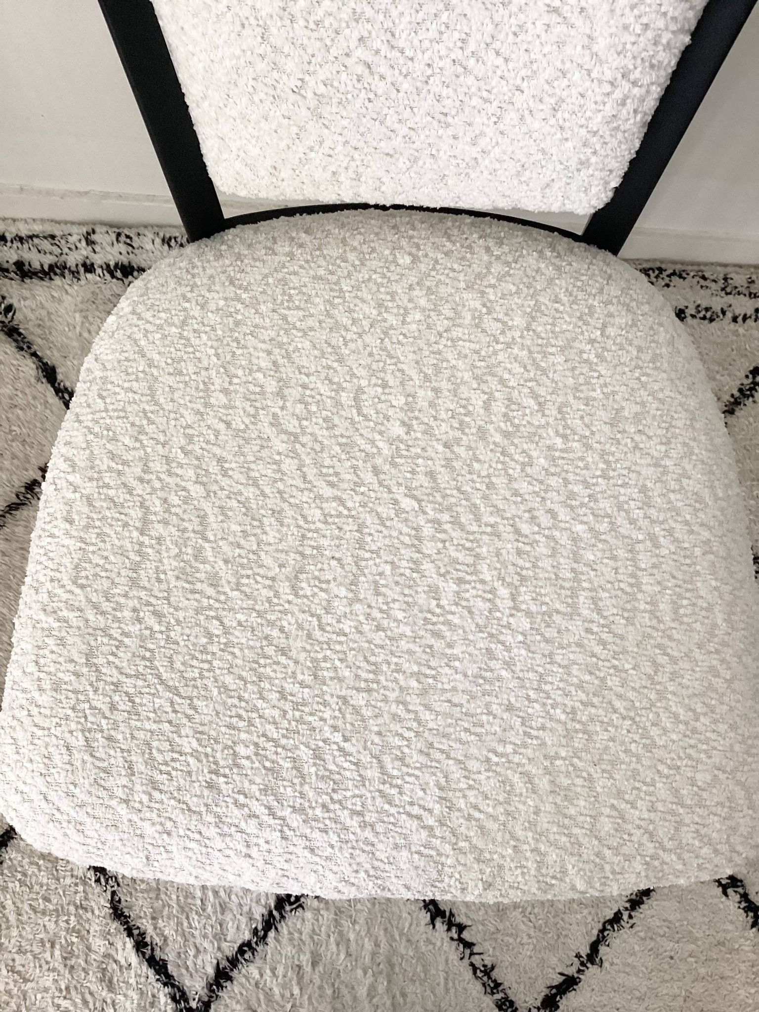 Fully restored vintage chair in boucle fabric.