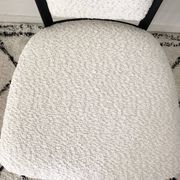 Fully restored vintage chair in boucle fabric.