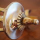 Suspension with 3 brass lights and a white glass globe from the 1950s-1960s.