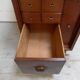 Antique watchmakers cabinet with drawers
