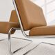 Vintage cantilever armchair. Brown faux leather upholstery. 60s