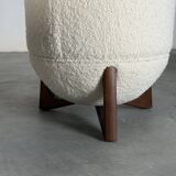 TOTEMO stools by FORME with ivory Dedar bouclé upholstery and walnut legs.