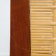4 wooden Art Deco design dining chairs with a wicker seat and backrest