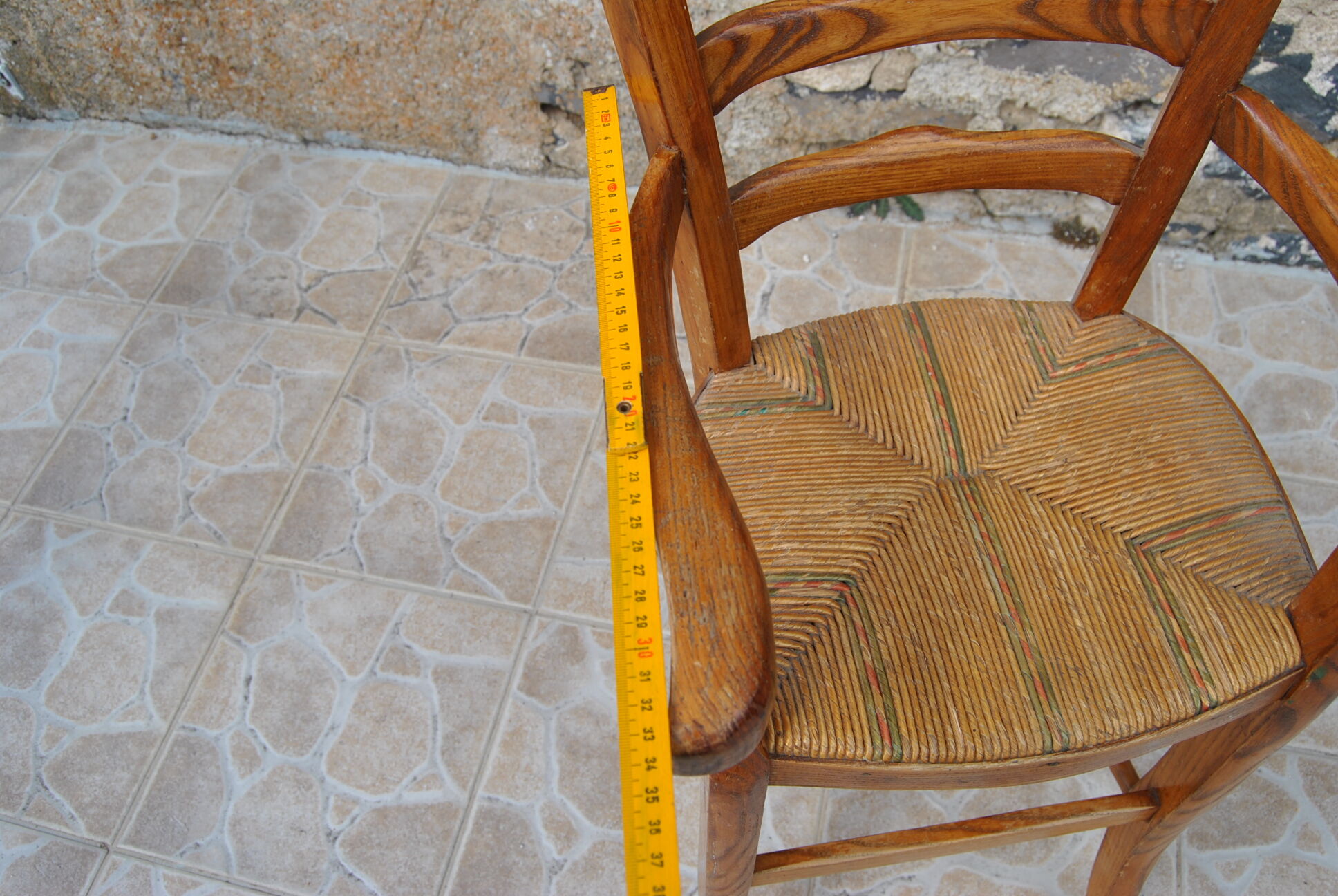 Wooden children's high chair and mulched seat