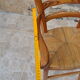 Wooden children's high chair and mulched seat
