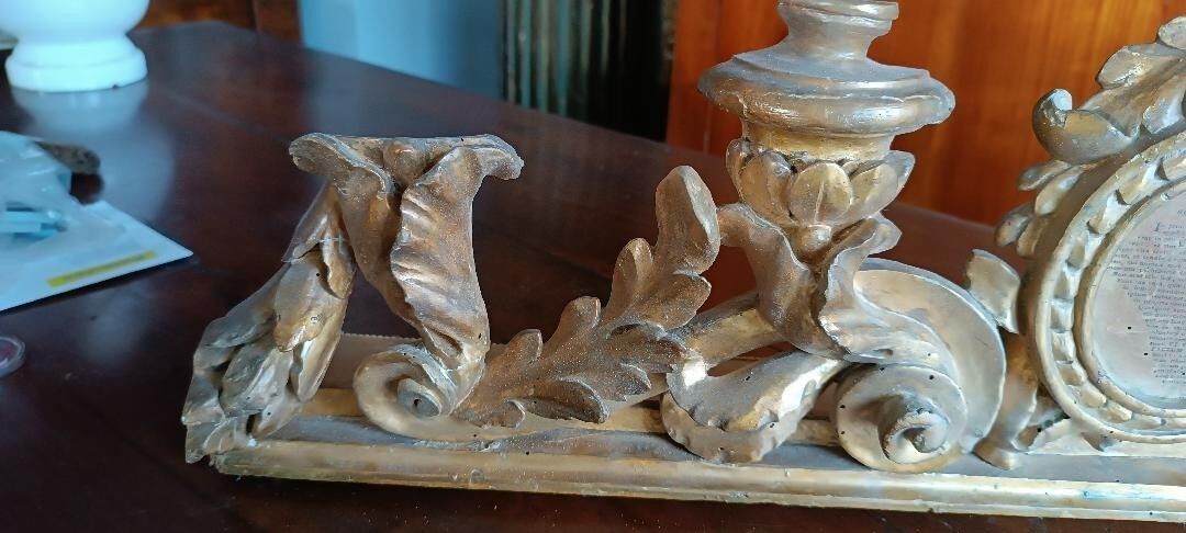 Ancient altar candlestick with gilded wooden cartagloria, 18th century.