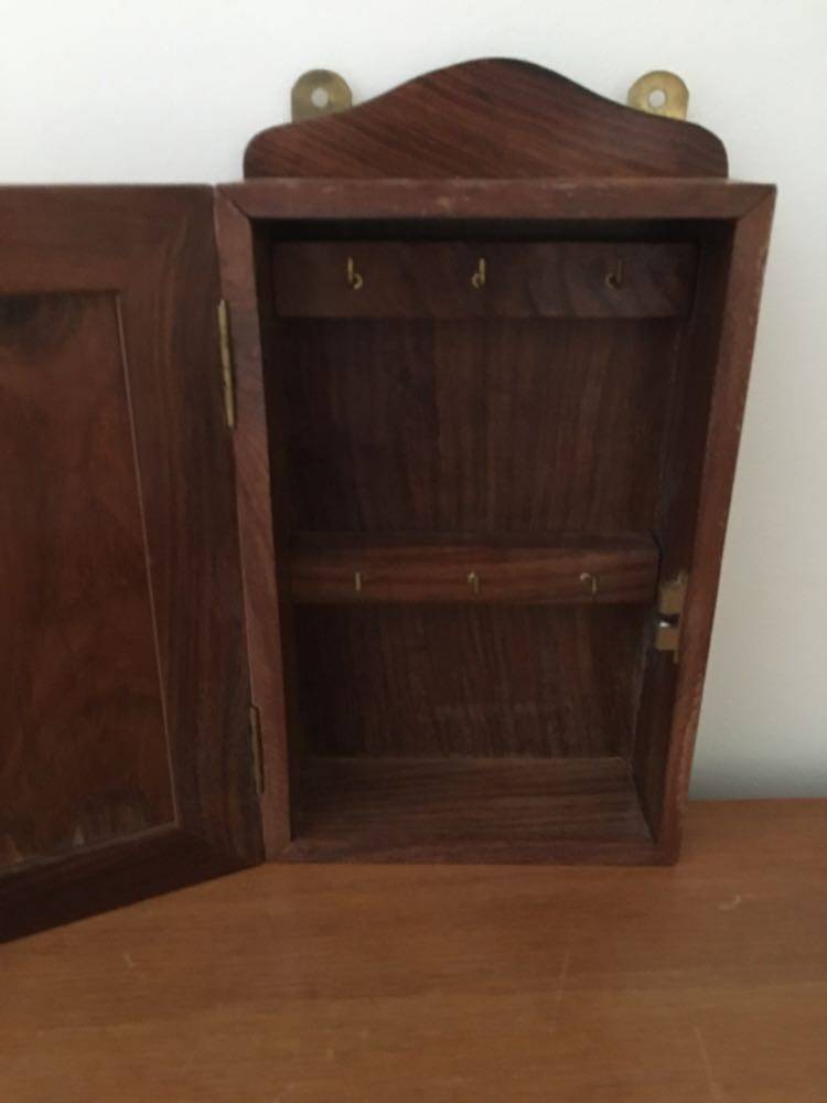 Key box in wood and brass and central motif representing a sailor's anchor