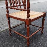 Corner chair turned wood straw seat