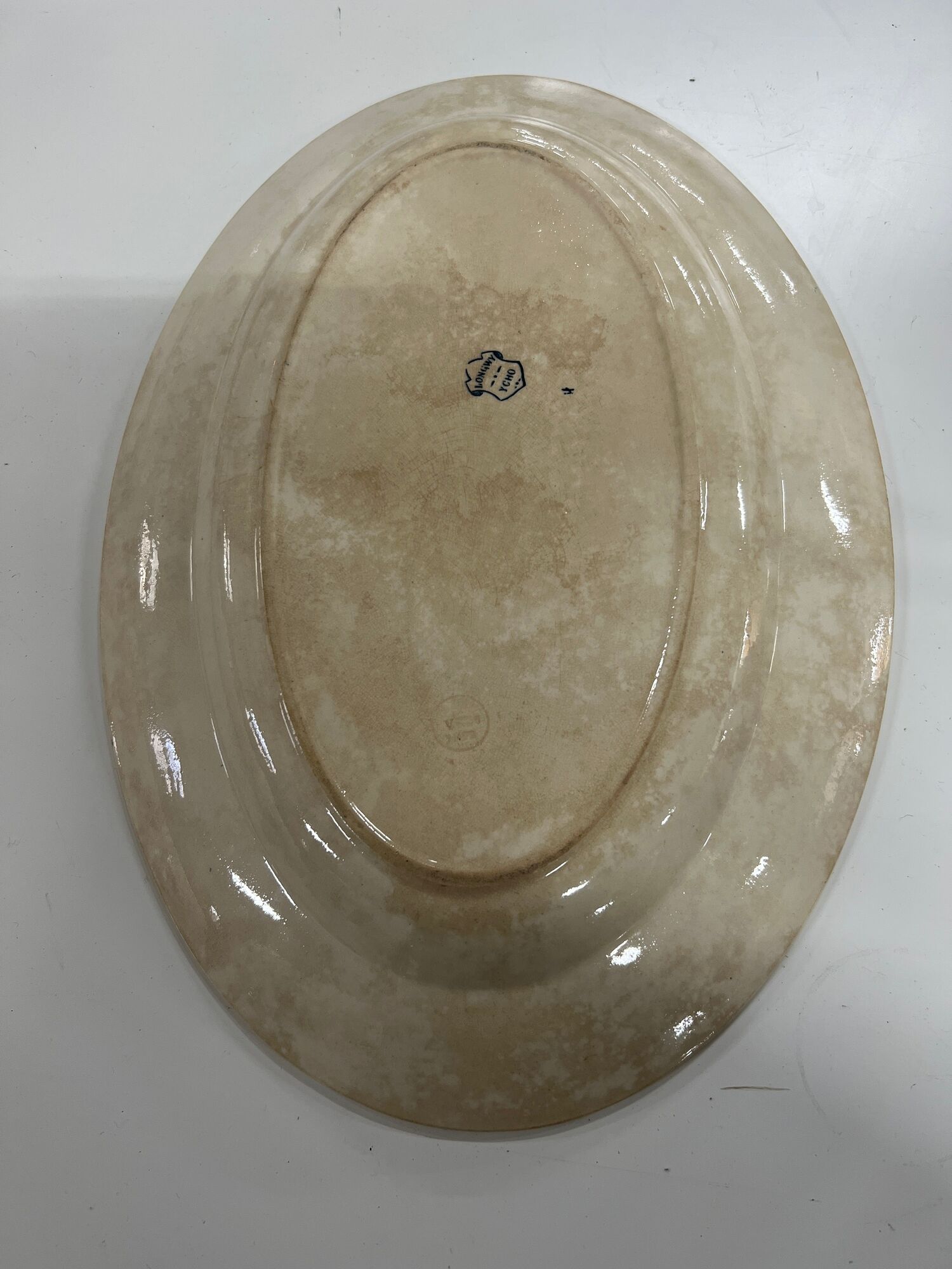 Plat ovale en porcelaine longwy signé yeho