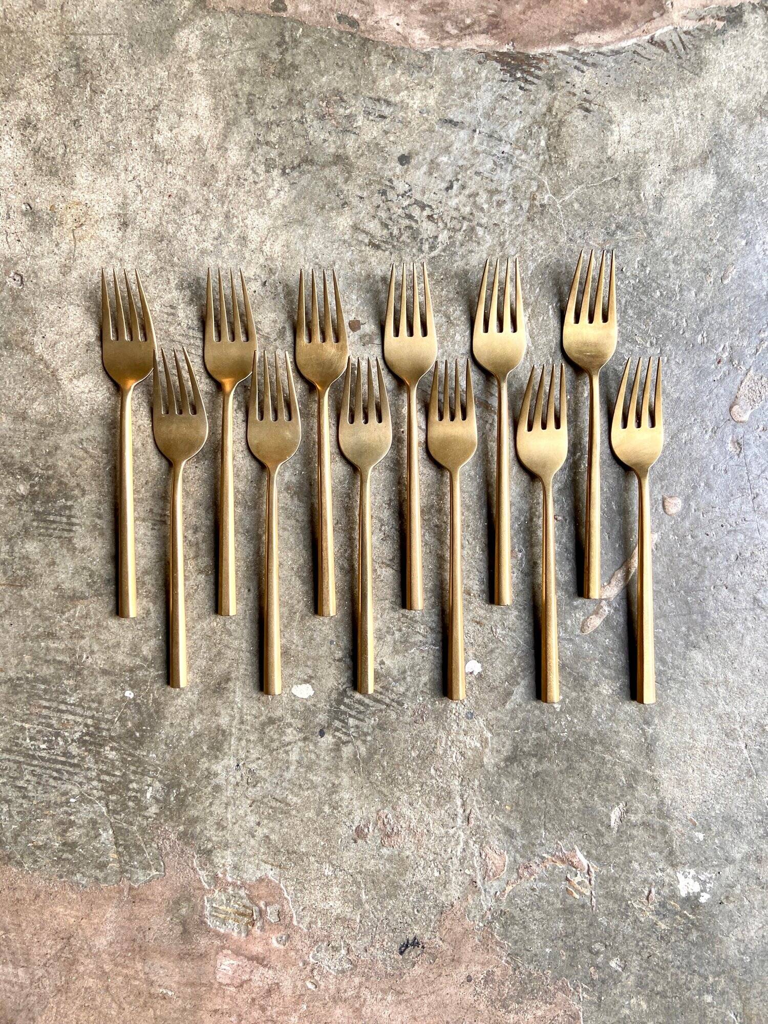 12 gilded bronze forks