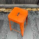 Orange metal workshop stool