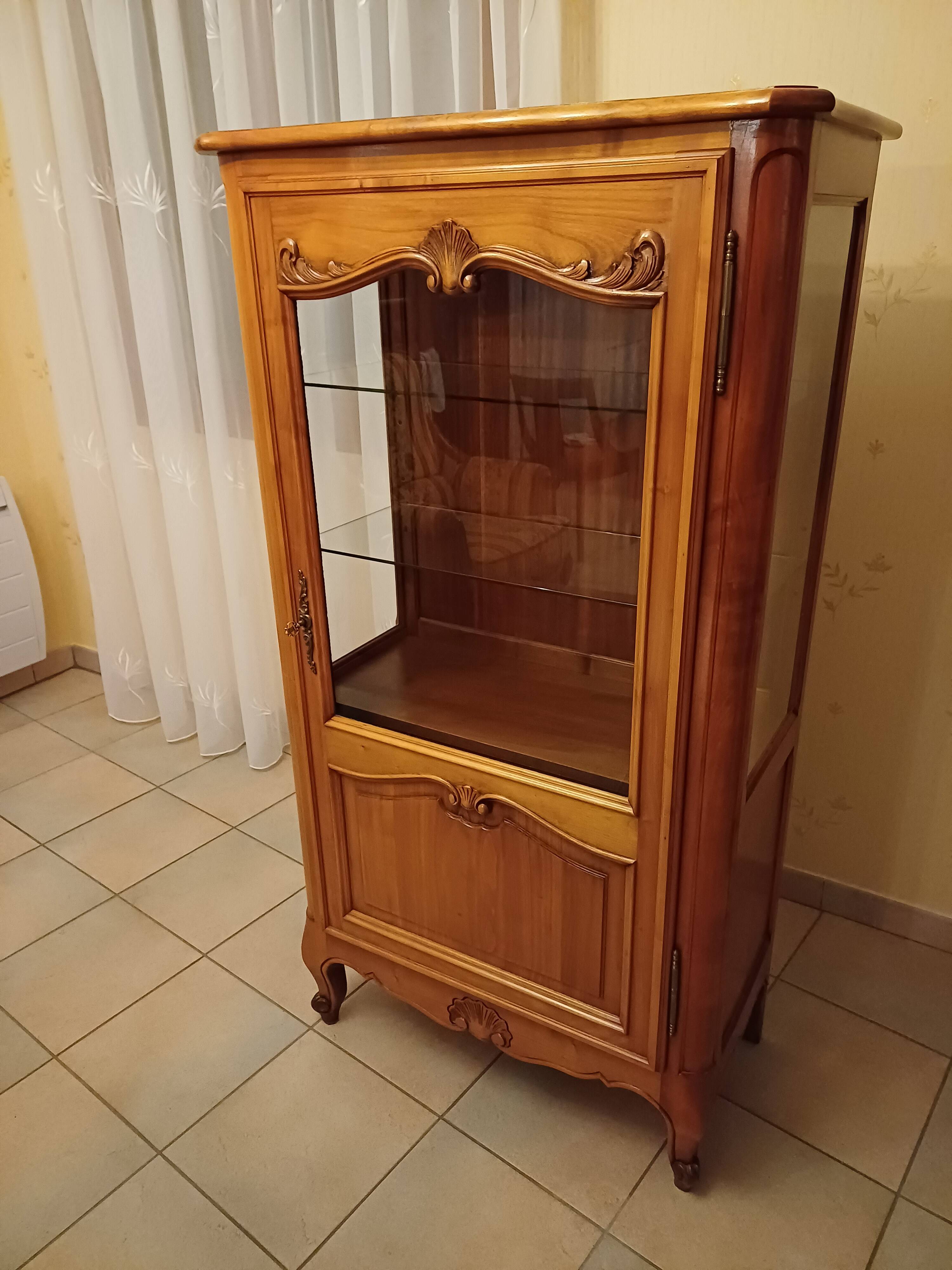 Solid wood display cabinet.