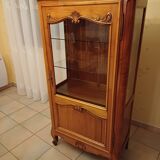 Solid wood display cabinet.