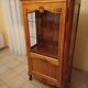 Solid wood display cabinet.