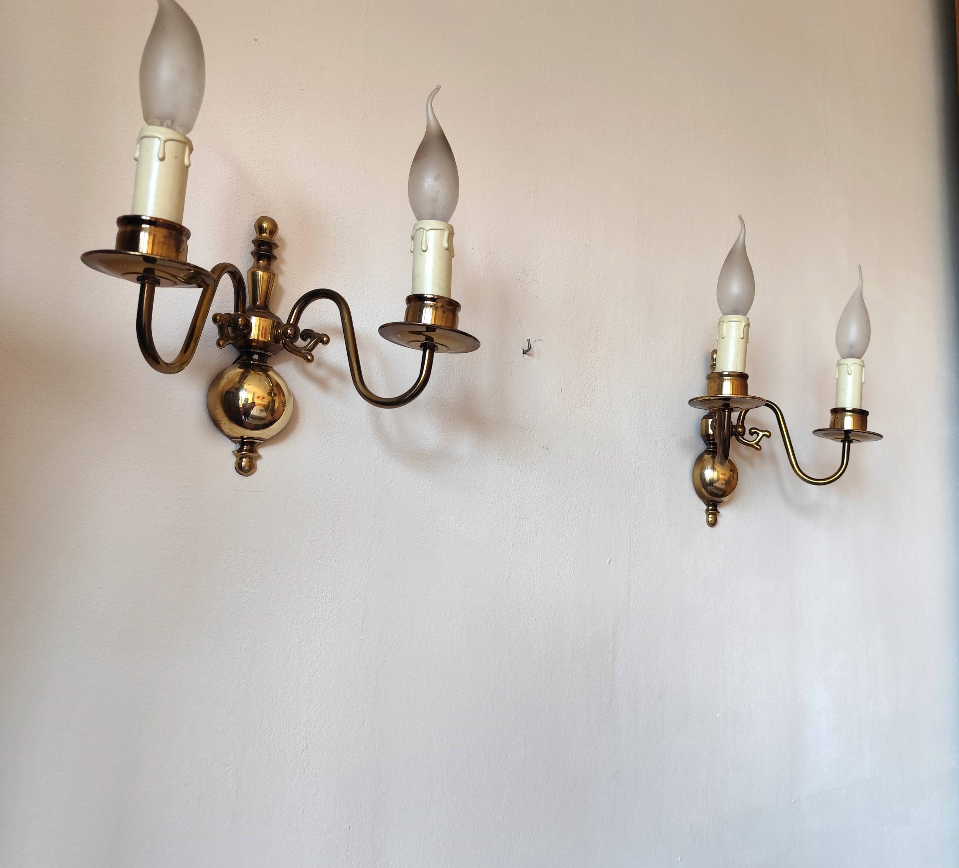 Pair of Dutch style 2-light brass wall lights