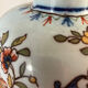 Old vase with floral motif inspired by desvres earthenware