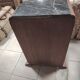 Pair of Art Deco half-moon bedside tables in walnut veneer and black marble.