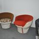 Set of 2 vintage 1970s tub chairs in brown, red, and white fabric with a enveloping silhouette.