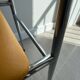 LM vintage chrome and orange/mustard yellow faux leather chairs
