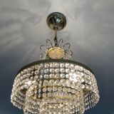 Cascade chandelier with crystal and brass tassels
