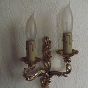 Brass wall lights.