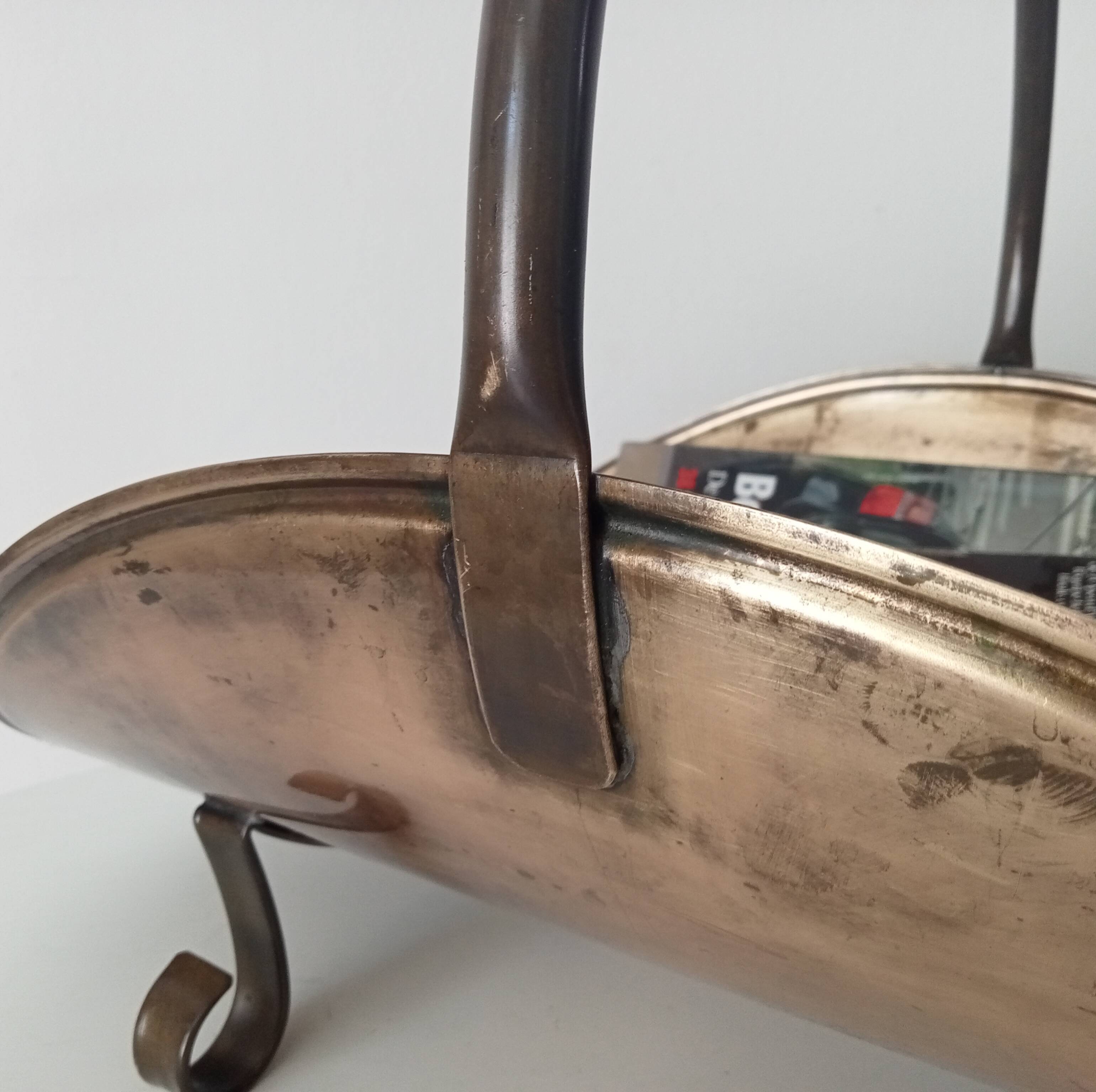 Old brass log holder