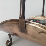 Old brass log holder