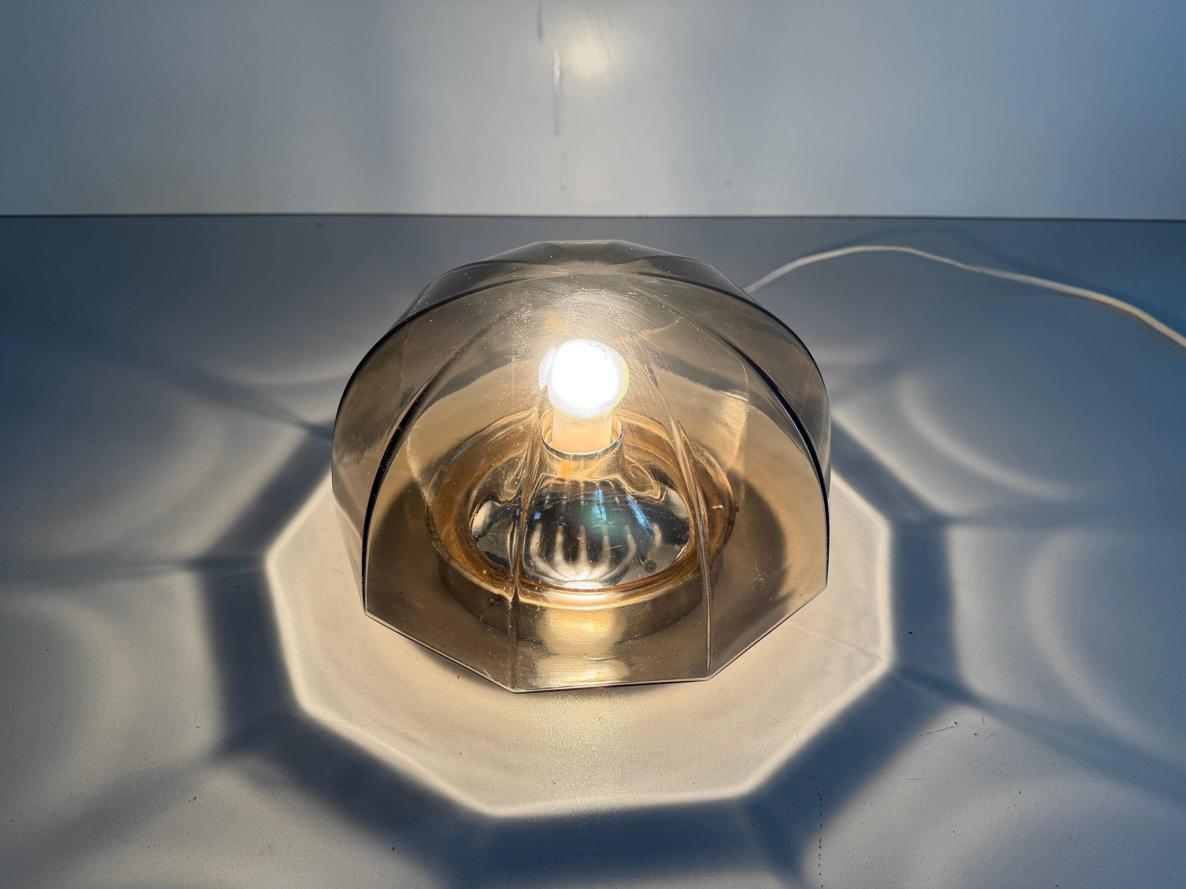 Flush-mounted brown glass fixture and metal base by N Leuchten, 1960s, Germany.