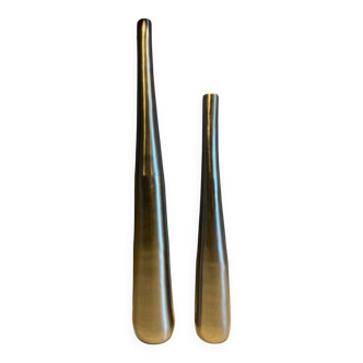 Dyptic vase in brushed chrome metal for single flowers.