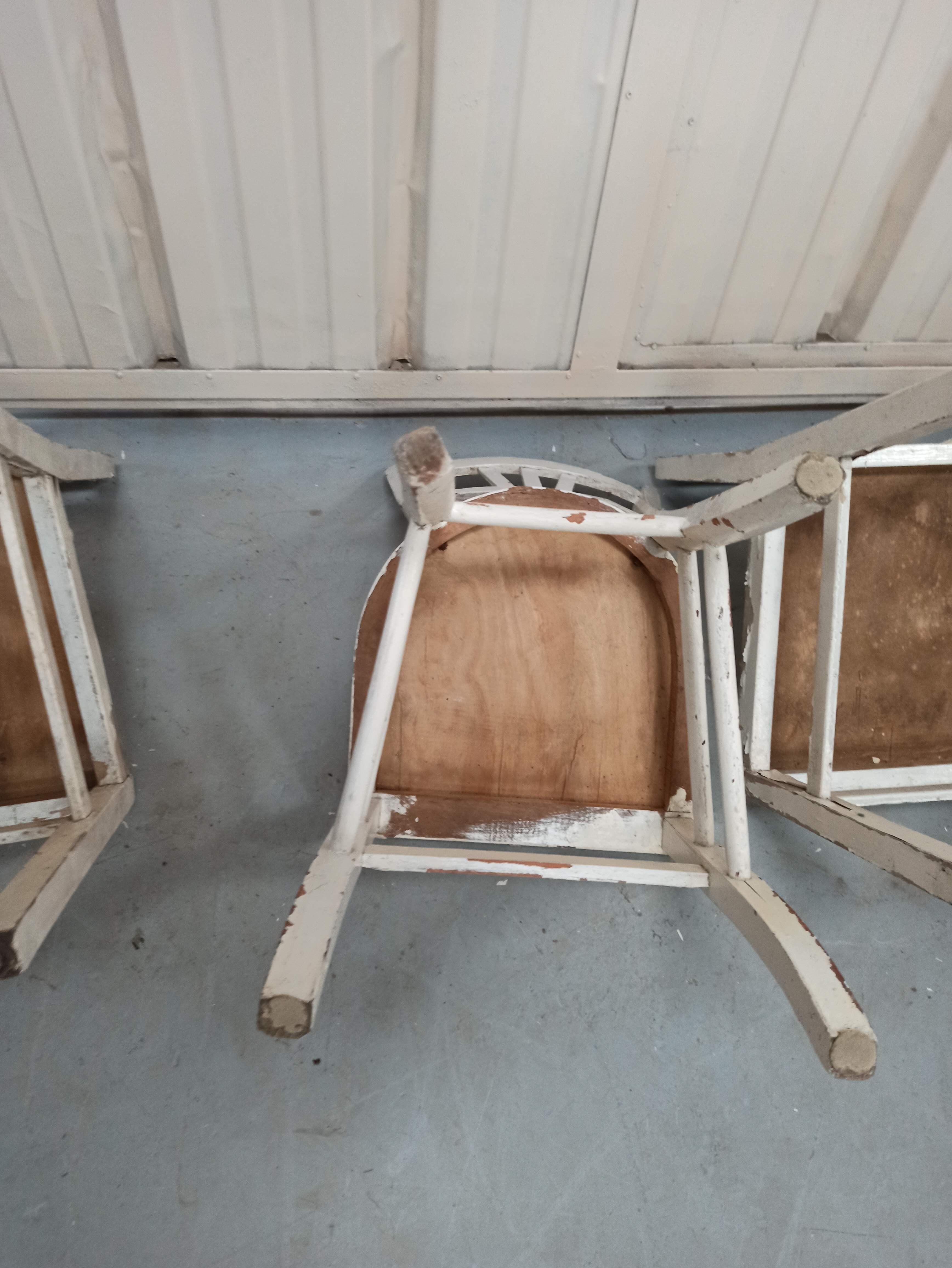 4 patinated white bistro chairs