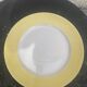Two earthenware dishes, one hollow and one white cake dish with yellow border