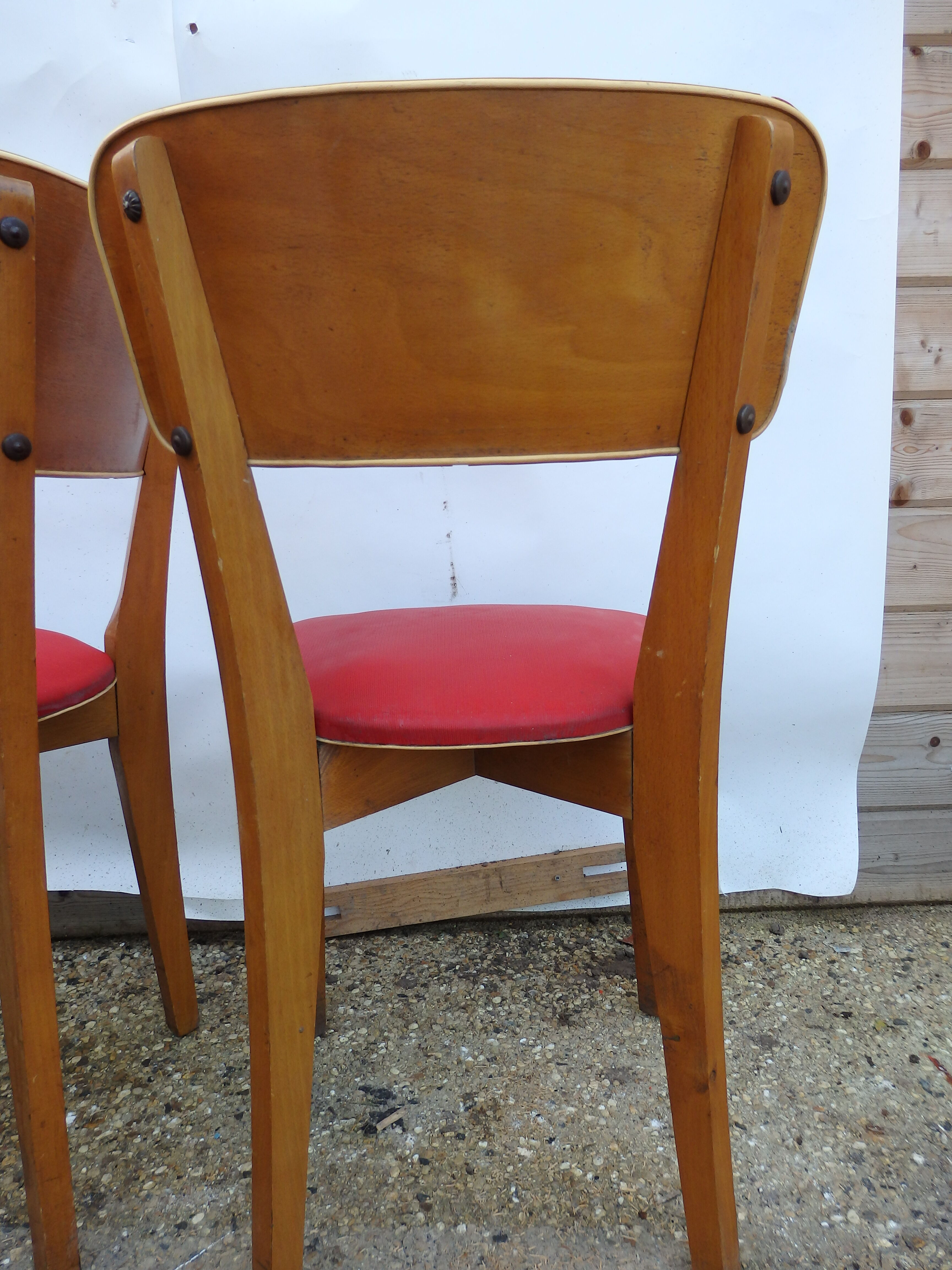2 vintage red chairs