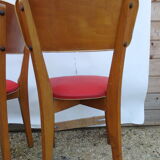 2 vintage red chairs