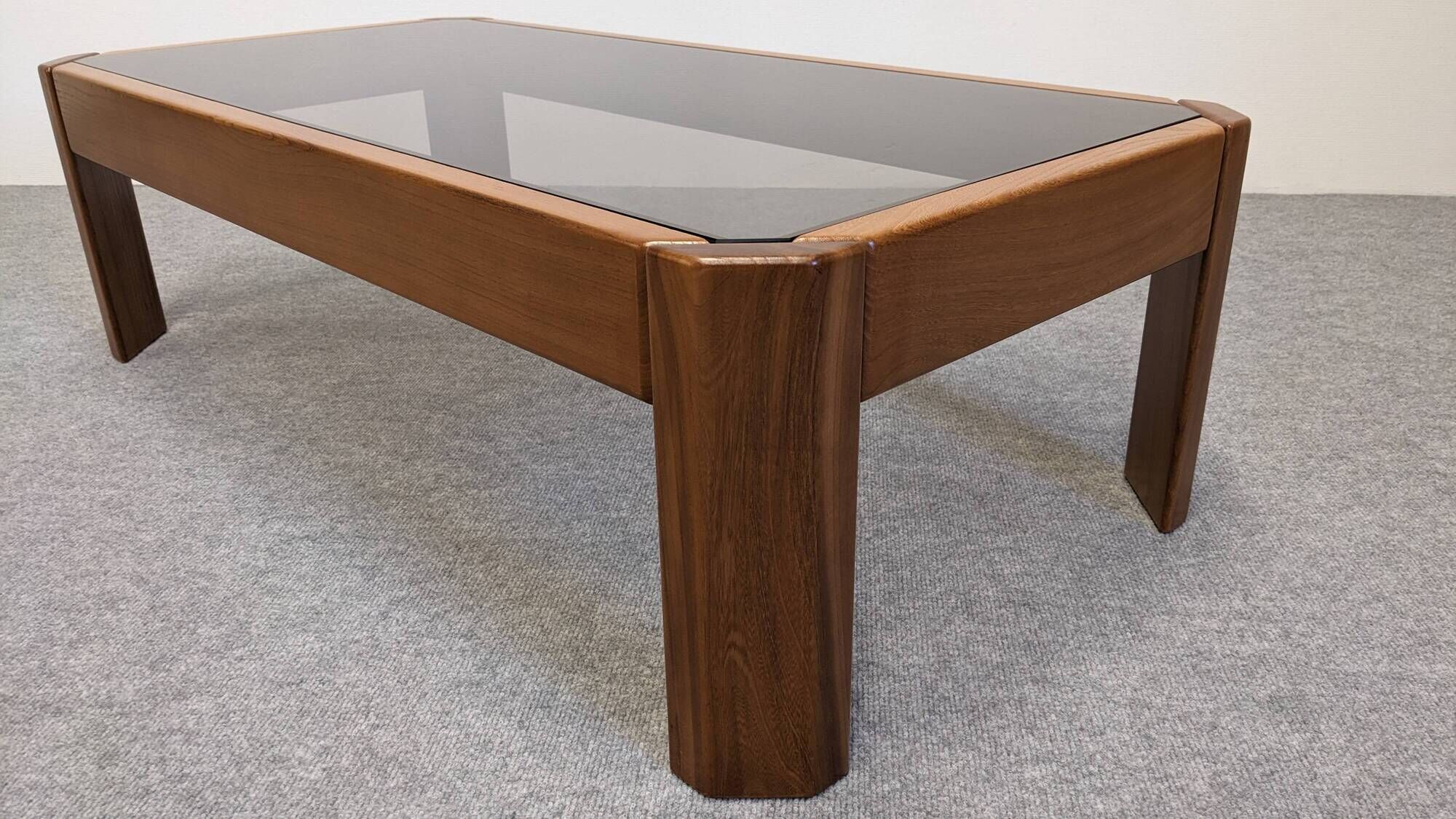 Modernist coffee table in elm and smoked glass, Italy circa 1970.