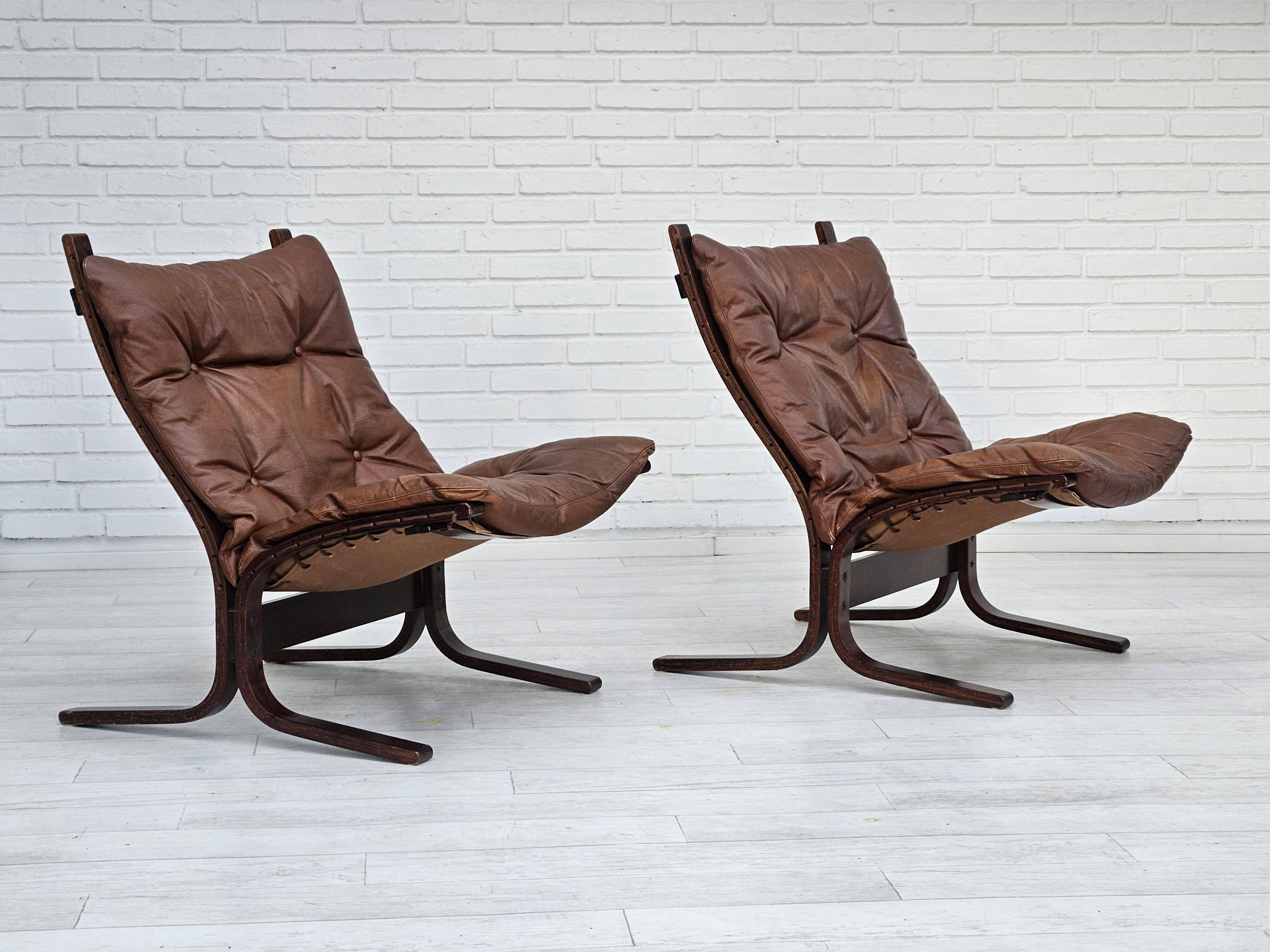 1970s, Norwegian design by Ingmar Relling, model "Siesta", pair of two chairs, original condition.