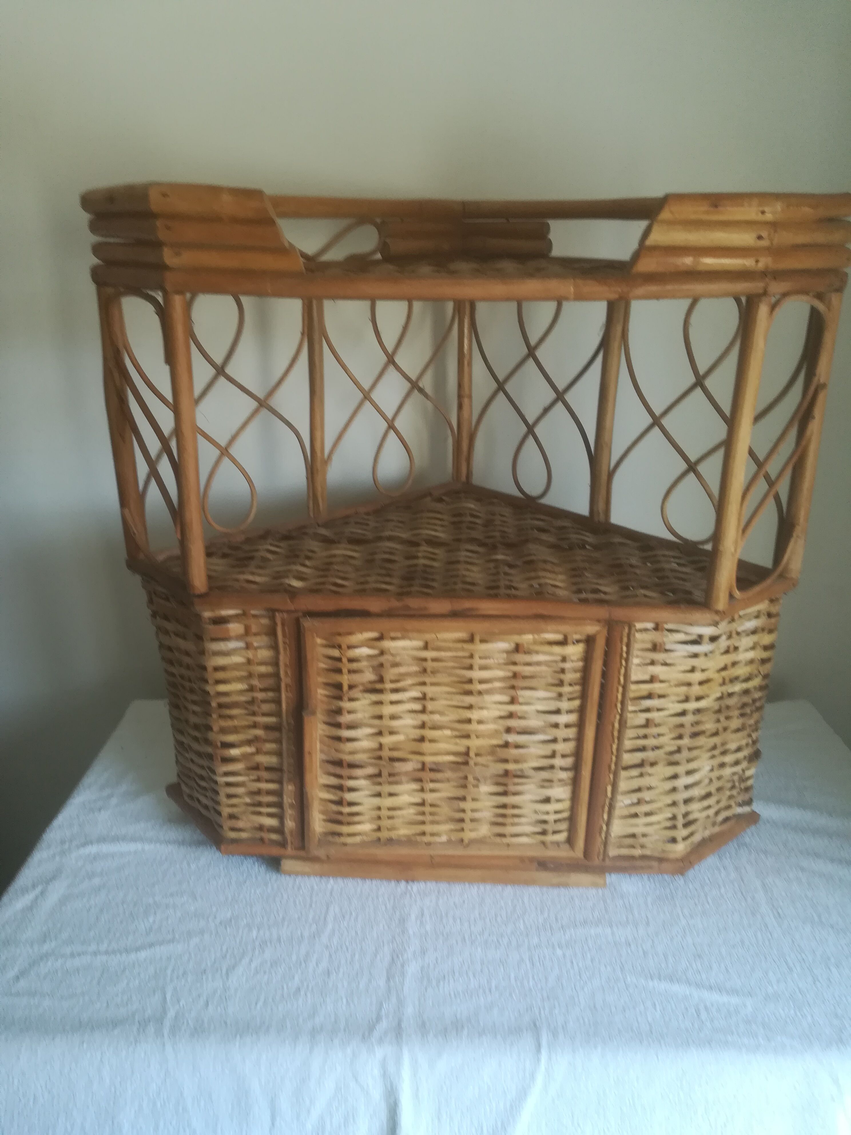 Vintage corner rattan shelf